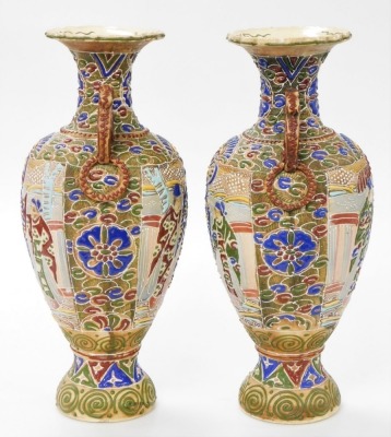 A pair of Meiji period Japanese Satsuma moriage vases, of twin handled baluster form, decorated with panels of priests, on a ground of flowers and scrolls, 39cm high. - 10