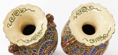 A pair of Meiji period Japanese Satsuma moriage vases, of twin handled baluster form, decorated with panels of priests, on a ground of flowers and scrolls, 39cm high. - 11