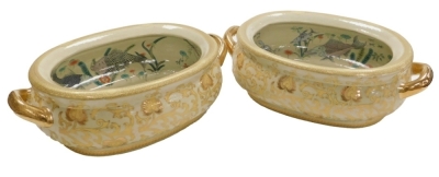 A pair of Chinese twin handled porcelain goldfish bowls, of oval form, decorated internally with fish, crabs, and pond fauna, the exterior with flowers and scrolling leaves on a cream ground, 48cm wide. - 5