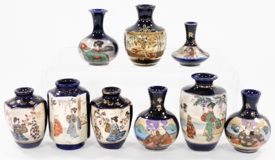 A group of Japanese blue ground pottery vases, decorated with reserves of figures, flowers and grasses. (9) - 5