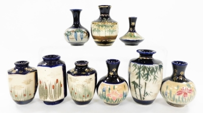 A group of Japanese blue ground pottery vases, decorated with reserves of figures, flowers and grasses. (9) - 6