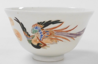 A group of Chinese and Japanese porcelain, including Japanese plates painted with birds and flowers, tea bowls, and a Chia Ching blue and white saucer. (a quantity) - 23