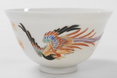 A group of Chinese and Japanese porcelain, including Japanese plates painted with birds and flowers, tea bowls, and a Chia Ching blue and white saucer. (a quantity) - 25