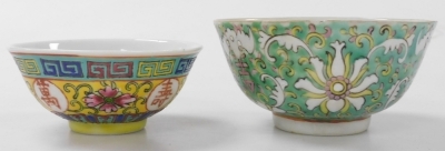 A group of Chinese and Japanese porcelain, including Japanese plates painted with birds and flowers, tea bowls, and a Chia Ching blue and white saucer. (a quantity) - 28