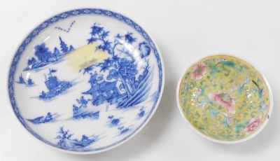 A group of Chinese and Japanese porcelain, including Japanese plates painted with birds and flowers, tea bowls, and a Chia Ching blue and white saucer. (a quantity) - 31