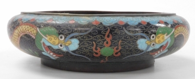 A group of Chinese metalwares, comprising a cloisonne vase decorated with prunus blossom on a yellow ground, 21cm high, cloisonne bowl decorated with dragons on a black ground, 20cm wide, bronzed metal tea canister, white metal vase, pair of wooden carvin - 21