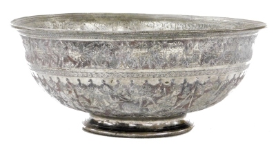 A late 19thC Indo Persian white metal bowl, embossed with figures, tents and animals, beneath a border of exotic birds, 32.5cm wide. - 6