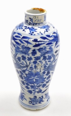 A late 19thC Chinese blue and white baluster vase, of baluster form, decorated with dragons and flowering shrubs, underglaze blue four character Kangxi mark to base, 19cm high, a Chinese export blue and white tea bowl, decorated with lake and landscape de - 14