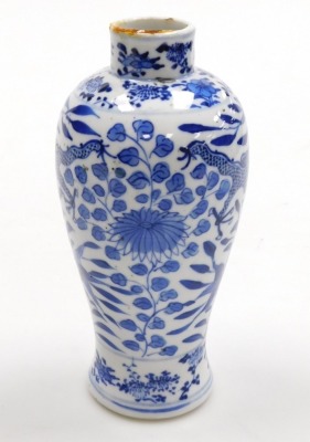 A late 19thC Chinese blue and white baluster vase, of baluster form, decorated with dragons and flowering shrubs, underglaze blue four character Kangxi mark to base, 19cm high, a Chinese export blue and white tea bowl, decorated with lake and landscape de - 15