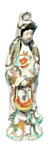 A 19thC Chinese porcelain figure modelled as Guan Yin, decorated in coloured enamels with gilt highlights, unmarked, 45cm high.