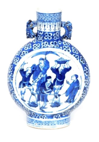 A Chinese blue and white porcelain moon flask, decorated to both sides with panels of figures, within a floral background, unmarked, 21cm high.