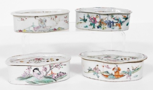 Four Chinese famille rose porcelain cricket boxes and covers, circa 1900, of oblong form, painted with figures, flowers, and Chinese characters.