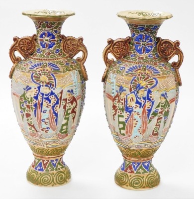 A pair of Meiji period Japanese Satsuma moriage vases, of twin handled baluster form, decorated with panels of priests, on a ground of flowers and scrolls, 39cm high. - 3