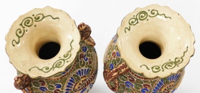 A pair of Meiji period Japanese Satsuma moriage vases, of twin handled baluster form, decorated with panels of priests, on a ground of flowers and scrolls, 39cm high. - 5