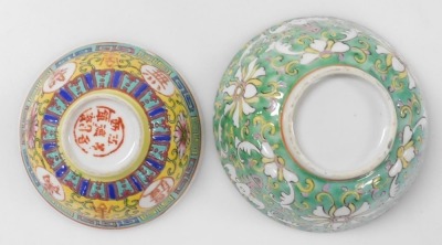 A group of Chinese and Japanese porcelain, including Japanese plates painted with birds and flowers, tea bowls, and a Chia Ching blue and white saucer. (a quantity) - 14