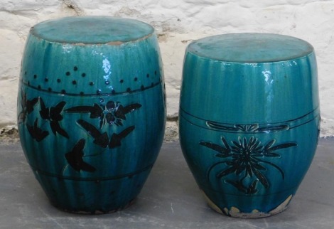 Two turquoise treacle glazed Chinese barrel seats, 40cm and 46cm high. (2)