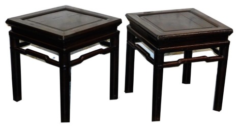 A pair of 19thC Chinese hardwood jardiniere stands, 52cm high, 47cm square.