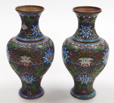 A pair of Chinese cloisonne baluster vases, enamelled on copper with a scrolling peony design and foliage, in polychrome enamels, 26cm high. - 2