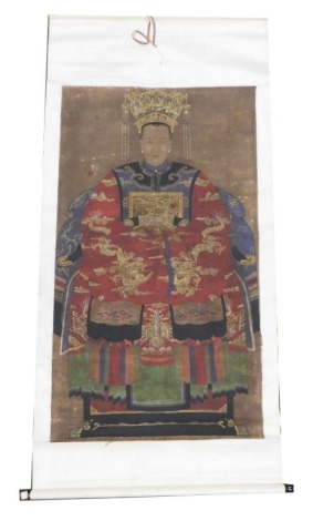 A Chinese ceremonial ancestor portrait scroll, depicting a Chinese Empress in red surcoat and wearing an elaborate headdress, watercolour on silk, 215cm x 102cm.