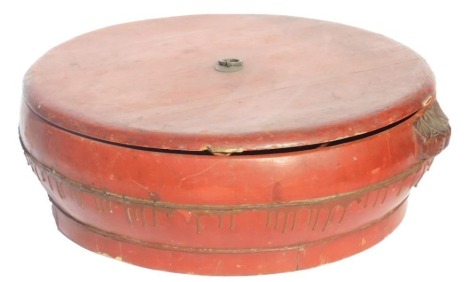 A Chinese red lacquer flour vessel and cover, with foliate carved handles, 60cm wide.