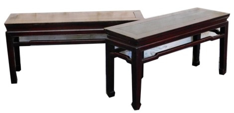 A near pair of Chinese hardwood altar tables, raised on square legs and scroll feet, 52cm high, 103cm wide, 34cm deep, and 50cm high, 107cm wide, 32cm deep. (2)