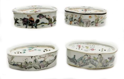 Four Chinese famille rose porcelain cricket boxes and covers, circa 1900, of oblong form, painted with figures, flowers, and Chinese characters.