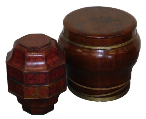 A Chinese circular food box, with brass banding, 35cm high, and an octagonal lacquered example. (2)