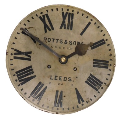 An early 20thC railway clock, the 46cm diameter Roman numeric dial marked Potts and Sons LD and ECR Leeds 24, fronting an eight day movement, with pendulum and key.