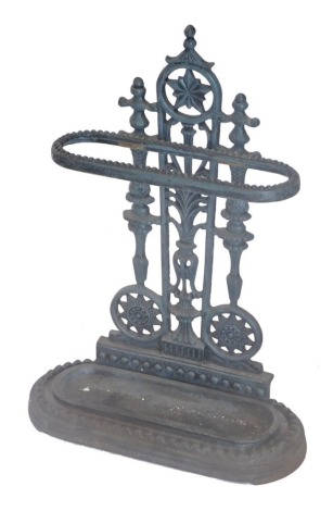 A Victorian style cast iron umbrella stand, with pierced back, beaded oblong compartment and removable well, partially painted blue, Coalbrookdale style, unmarked, 65cm high.