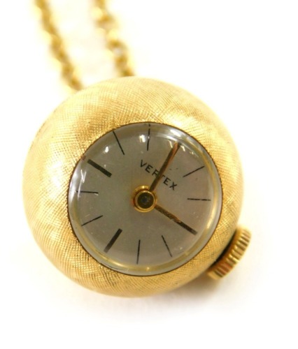 A Vertex globe pendant watch on chain marked 18ct, watch case marked with a female head.