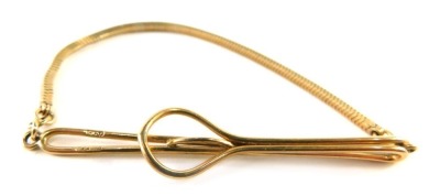 A 9ct gold gentleman's tie clip with chain, 6.9g all in.