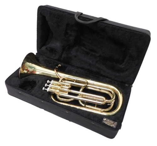 A brass tenor horn, JP73, with three valves, 58cm high, in John Packer case.