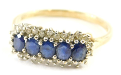 A sapphire and diamond ring in 9ct gold, size T-U, 3g all in.