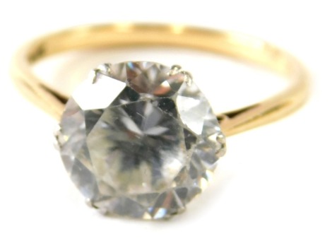 A dress ring marked 9ct and platinum set with a large paste stone, size S, 3.3g.