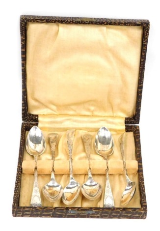 A set of six Edward VII silver teaspoons, bright cut Old English pattern, Birmingham 1904, 12cm long, 1.8oz, cased.