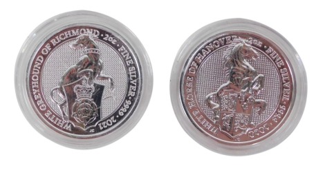 Two 2oz fine silver coins, Whitehorse of Hanover and The Greyhound of Richmond, each marked 2oz 9999. (2 cased)