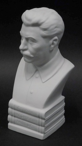 A mid 20thC Dulevo parian figure of Stalin, signed B. Bornhbob 1937, 20cm high.