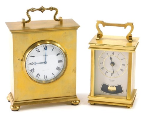 A Metamec brass cased carriage clock with Roman numeric dial and visible pendulum with quartz movement