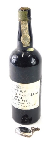 A vintage bottle of Taylor's 1974 Port, 75cl and a silver port label. (2)