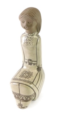 A hollow USSR pottery figure of a girl in flowing robes, labelled, 31cm high.