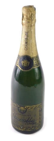 A bottle of Lacotte and Epernay brut reserve champagne.