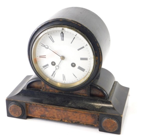 A 19thC burr and ebonised mantel clock, the 13cm diameter Roman numeric dial revealing an eight day movement, striking on a bell, numbered 5770, with pendulum, in a scroll case, 24cm high.