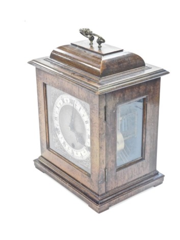 A 20thC Elliot style caddy top mantel clock, with 13cm diameter Arabic and Roman numeric dials, with raised metal spandrels, in shaped case, with Westminster chiming action striking on the hour, with pendulum, 32cm high.