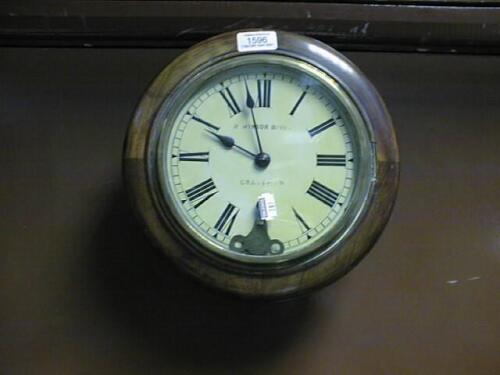 A Victorian chain wall clock with moulded mahogany bezel