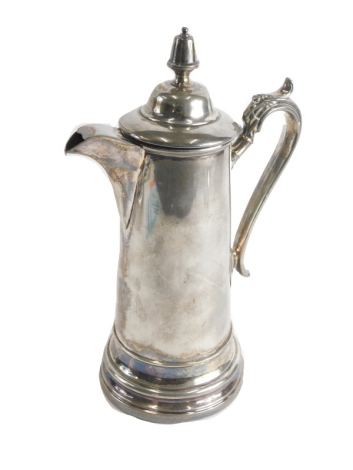 An early 20thC silver plated coffee pot, with acorn finial, domed lid, acanthus leaf handle, with plain spout, on circular foot, 36cm high.