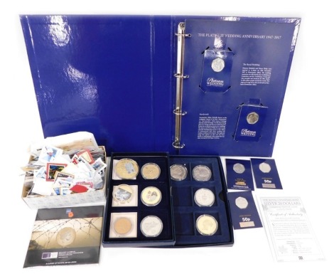 Various coins, a Queen Elizabeth II fifty pence coin collection album, containing various fifty pence coins, various other coin sets, blister pack fifty pences, D Day coin presentation pack, various other cased coins, two dollar Pitcairn Islands, gold pla