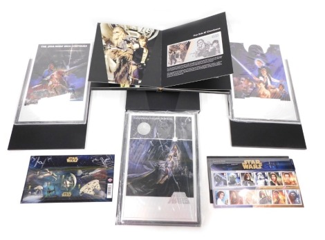 A Star Wars Empire Strikes Back premium foil silver collection set, another Return of The Jedi, a New Hope Booklet similar, etc., and a small quantity of stamps in original packaging. (a quantity)