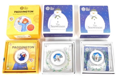 Various Royal Mint collectors coins, The Snowman 2019 fifty pence silver proof, another, Paddington fifty pence silver proof. (3, with outer boxes and some ephemera)