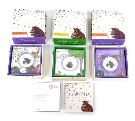 Three Royal Mint The Gruffalo celebrating 20 years silver proof fifty pence coins, each in outer boxes with paperwork. (3)