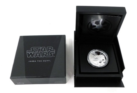 A Star Wars Jaba The Hutt 1oz fine silver proof coin, in outer box with paperwork.